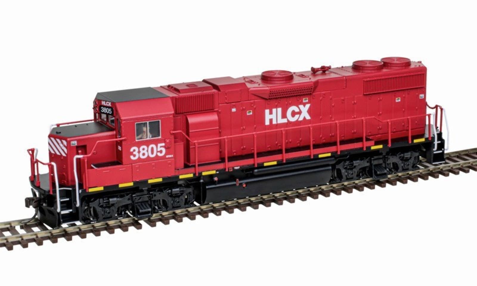 白い背景の線路に置いた、赤い車体に白い「HLCX」と「3805」の文字のディーゼル機関車の模型
