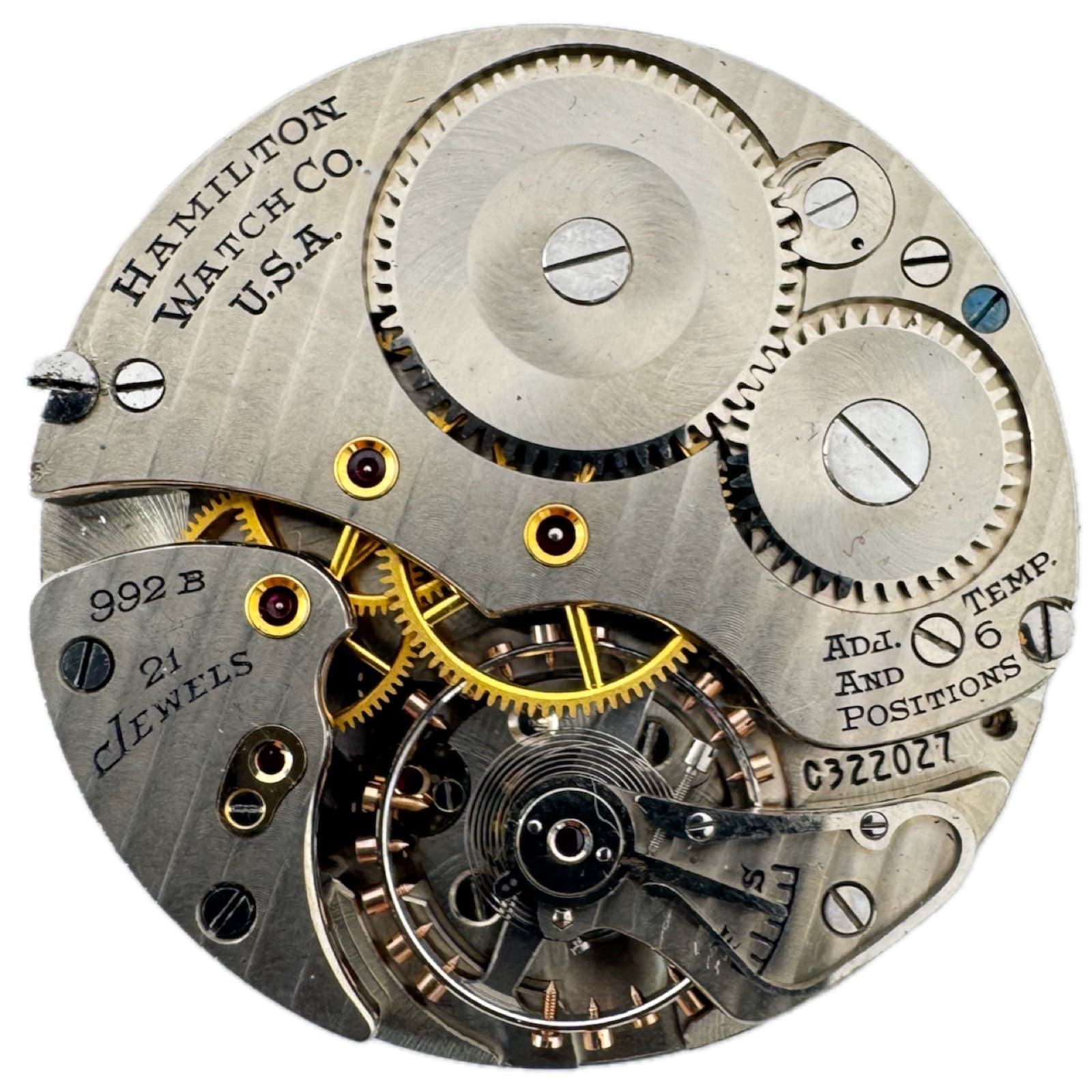 ケースから出した懐中時計の機械の裏側。「HAMILTON WATCH CO. U.S.A.」「992B」「21 Jewels」の刻印がある