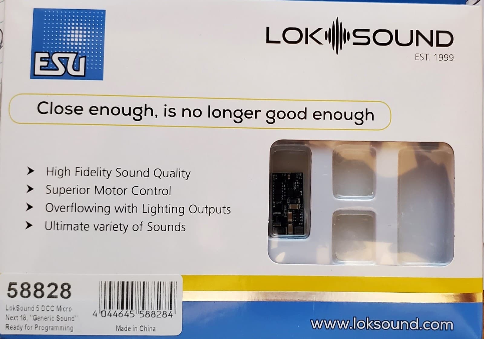 LokSoundの箱。窓から小さな基板が見え、下の札に「58828」の番号